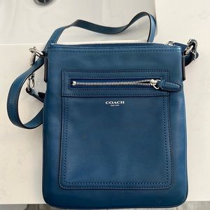 Blue leather coach crossbody bag.
